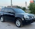Черный Ниссан ИксТрейл, объемом двигателя 2.5 л и пробегом 150 тыс. км за 10999 $, фото 3 на Automoto.ua