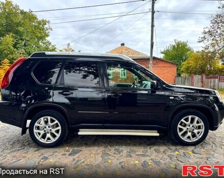 Черный Ниссан ИксТрейл, объемом двигателя 2.5 л и пробегом 159 тыс. км за 11780 $, фото 2 на Automoto.ua