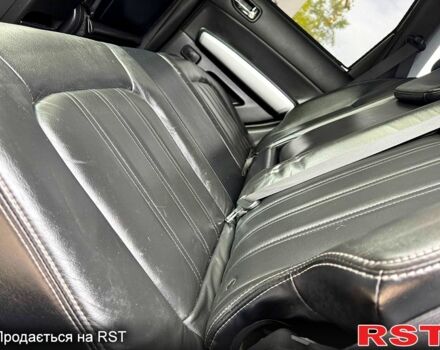 Черный Ниссан ИксТрейл, объемом двигателя 2.5 л и пробегом 159 тыс. км за 11780 $, фото 5 на Automoto.ua