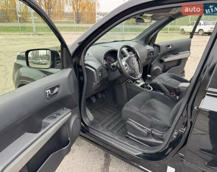 Черный Ниссан ИксТрейл, объемом двигателя 2 л и пробегом 11 тыс. км за 18500 $, фото 29 на Automoto.ua