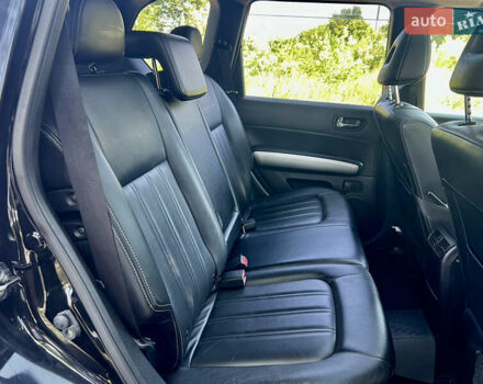 Черный Ниссан ИксТрейл, объемом двигателя 2 л и пробегом 125 тыс. км за 12300 $, фото 42 на Automoto.ua