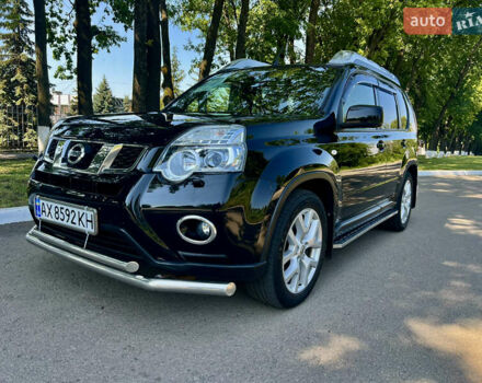 Черный Ниссан ИксТрейл, объемом двигателя 2 л и пробегом 125 тыс. км за 12300 $, фото 1 на Automoto.ua