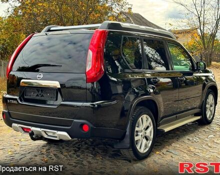 Черный Ниссан ИксТрейл, объемом двигателя 2.5 л и пробегом 159 тыс. км за 11780 $, фото 3 на Automoto.ua