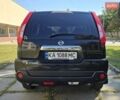 Чорний Ніссан ІксТрейл, об'ємом двигуна 2 л та пробігом 129 тис. км за 13000 $, фото 3 на Automoto.ua