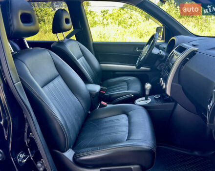 Черный Ниссан ИксТрейл, объемом двигателя 2 л и пробегом 125 тыс. км за 12300 $, фото 44 на Automoto.ua