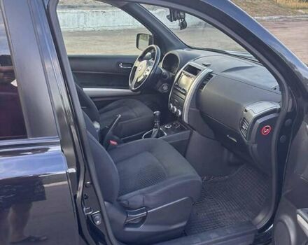 Черный Ниссан ИксТрейл, объемом двигателя 2 л и пробегом 260 тыс. км за 11500 $, фото 12 на Automoto.ua