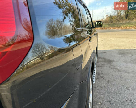 Чорний Ніссан ІксТрейл, об'ємом двигуна 2 л та пробігом 125 тис. км за 12999 $, фото 12 на Automoto.ua