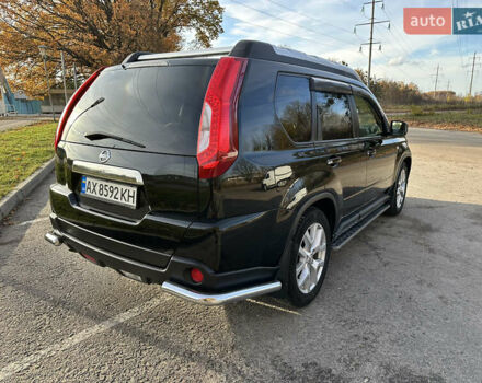 Чорний Ніссан ІксТрейл, об'ємом двигуна 2 л та пробігом 125 тис. км за 12999 $, фото 6 на Automoto.ua