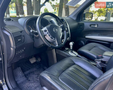 Черный Ниссан ИксТрейл, объемом двигателя 2 л и пробегом 125 тыс. км за 12300 $, фото 32 на Automoto.ua