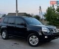 Черный Ниссан ИксТрейл, объемом двигателя 2.5 л и пробегом 150 тыс. км за 10999 $, фото 1 на Automoto.ua