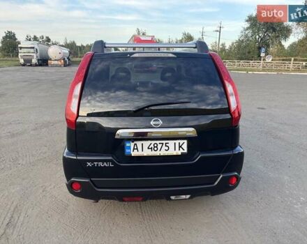 Черный Ниссан ИксТрейл, объемом двигателя 2 л и пробегом 260 тыс. км за 11500 $, фото 3 на Automoto.ua