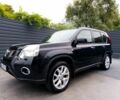 Чорний Ніссан ІксТрейл, об'ємом двигуна 2 л та пробігом 175 тис. км за 13799 $, фото 1 на Automoto.ua