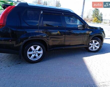 Черный Ниссан ИксТрейл, объемом двигателя 2 л и пробегом 230 тыс. км за 10400 $, фото 1 на Automoto.ua