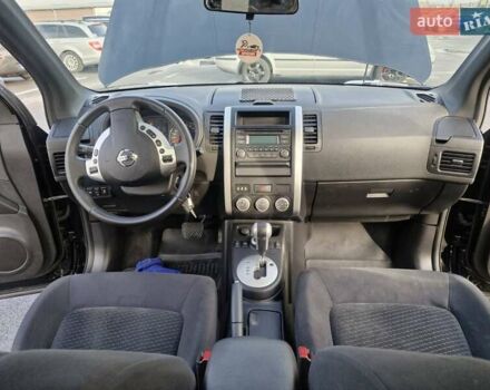 Черный Ниссан ИксТрейл, объемом двигателя 2 л и пробегом 114 тыс. км за 14000 $, фото 14 на Automoto.ua