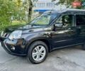 Чорний Ніссан ІксТрейл, об'ємом двигуна 2 л та пробігом 199 тис. км за 12990 $, фото 4 на Automoto.ua