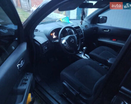 Чорний Ніссан ІксТрейл, об'ємом двигуна 2 л та пробігом 190 тис. км за 11700 $, фото 10 на Automoto.ua