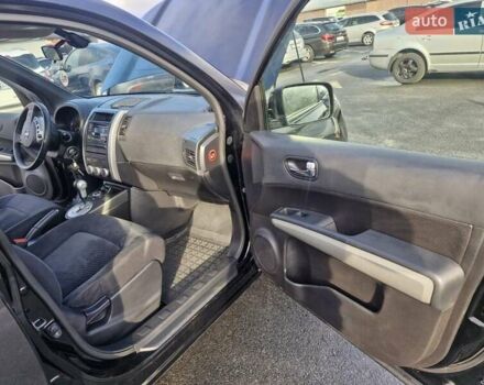 Черный Ниссан ИксТрейл, объемом двигателя 2 л и пробегом 114 тыс. км за 14000 $, фото 15 на Automoto.ua