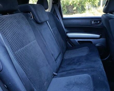 Черный Ниссан ИксТрейл, объемом двигателя 2 л и пробегом 132 тыс. км за 12800 $, фото 26 на Automoto.ua