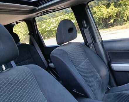 Черный Ниссан ИксТрейл, объемом двигателя 2 л и пробегом 132 тыс. км за 12800 $, фото 16 на Automoto.ua