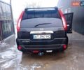 Черный Ниссан ИксТрейл, объемом двигателя 2 л и пробегом 230 тыс. км за 10400 $, фото 6 на Automoto.ua