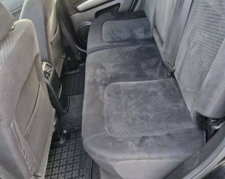 Черный Ниссан ИксТрейл, объемом двигателя 2 л и пробегом 114 тыс. км за 14000 $, фото 13 на Automoto.ua