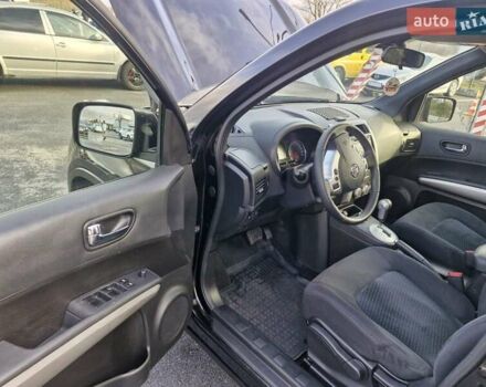 Черный Ниссан ИксТрейл, объемом двигателя 2 л и пробегом 114 тыс. км за 14000 $, фото 11 на Automoto.ua