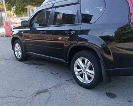 Черный Ниссан ИксТрейл, объемом двигателя 2 л и пробегом 132 тыс. км за 12800 $, фото 3 на Automoto.ua