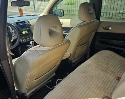 Черный Ниссан ИксТрейл, объемом двигателя 2.49 л и пробегом 171 тыс. км за 12300 $, фото 2 на Automoto.ua