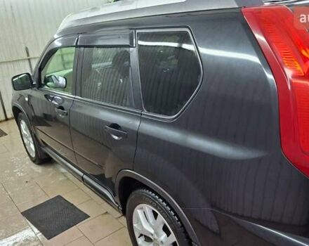 Черный Ниссан ИксТрейл, объемом двигателя 2 л и пробегом 213 тыс. км за 11950 $, фото 1 на Automoto.ua