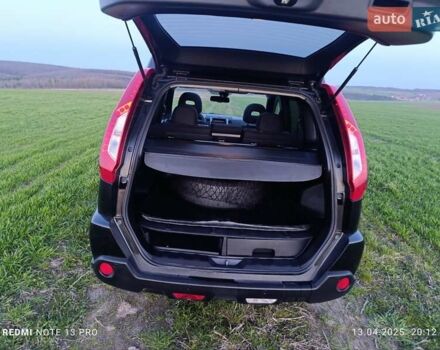 Черный Ниссан ИксТрейл, объемом двигателя 2 л и пробегом 206 тыс. км за 11600 $, фото 16 на Automoto.ua