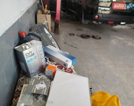 Черный Ниссан ИксТрейл, объемом двигателя 2 л и пробегом 206 тыс. км за 11600 $, фото 18 на Automoto.ua