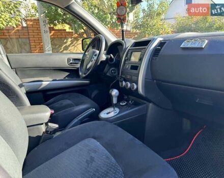 Чорний Ніссан ІксТрейл, об'ємом двигуна 2 л та пробігом 228 тис. км за 15200 $, фото 9 на Automoto.ua