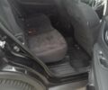 Черный Ниссан ИксТрейл, объемом двигателя 2 л и пробегом 153 тыс. км за 15500 $, фото 4 на Automoto.ua
