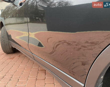 Черный Ниссан ИксТрейл, объемом двигателя 1.6 л и пробегом 210 тыс. км за 12800 $, фото 4 на Automoto.ua