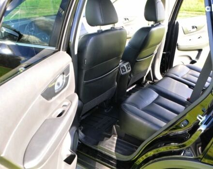 Черный Ниссан ИксТрейл, объемом двигателя 2 л и пробегом 169 тыс. км за 7953 $, фото 12 на Automoto.ua