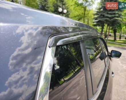 Черный Ниссан ИксТрейл, объемом двигателя 1.6 л и пробегом 65 тыс. км за 24200 $, фото 2 на Automoto.ua