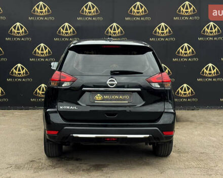 Черный Ниссан ИксТрейл, объемом двигателя 2 л и пробегом 129 тыс. км за 18300 $, фото 4 на Automoto.ua