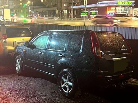 Черный Ниссан ИксТрейл, объемом двигателя 2.2 л и пробегом 372 тыс. км за 3500 $, фото 1 на Automoto.ua