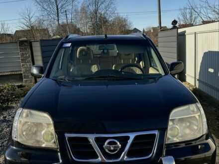 Черный Ниссан ИксТрейл, объемом двигателя 2 л и пробегом 250 тыс. км за 5500 $, фото 1 на Automoto.ua