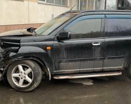 Черный Ниссан ИксТрейл, объемом двигателя 2 л и пробегом 335 тыс. км за 2379 $, фото 1 на Automoto.ua