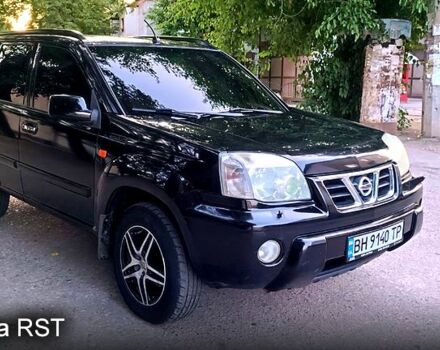 Черный Ниссан ИксТрейл, объемом двигателя 2 л и пробегом 257 тыс. км за 5800 $, фото 1 на Automoto.ua