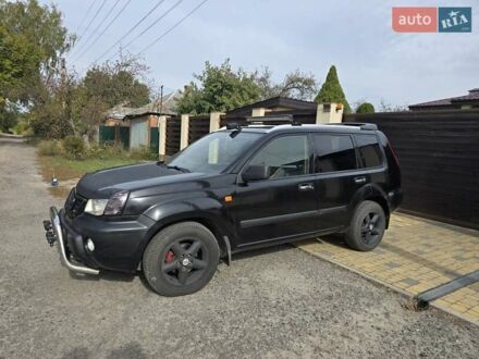 Черный Ниссан ИксТрейл, объемом двигателя 2.2 л и пробегом 300 тыс. км за 3300 $, фото 1 на Automoto.ua