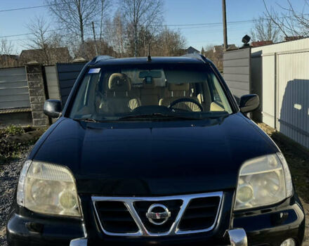 Чорний Ніссан ІксТрейл, об'ємом двигуна 2 л та пробігом 250 тис. км за 5500 $, фото 1 на Automoto.ua