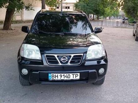 Черный Ниссан ИксТрейл, объемом двигателя 2 л и пробегом 300 тыс. км за 6300 $, фото 1 на Automoto.ua