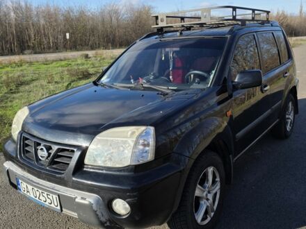 Черный Ниссан ИксТрейл, объемом двигателя 2 л и пробегом 365 тыс. км за 4013 $, фото 1 на Automoto.ua