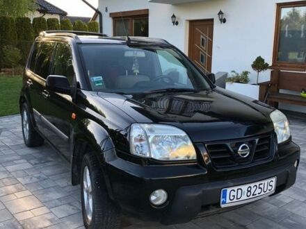 Черный Ниссан ИксТрейл, объемом двигателя 2.2 л и пробегом 310 тыс. км за 2700 $, фото 1 на Automoto.ua