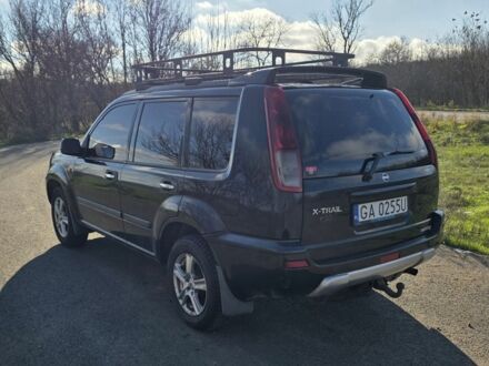 Черный Ниссан ИксТрейл, объемом двигателя 2 л и пробегом 365 тыс. км за 4023 $, фото 1 на Automoto.ua