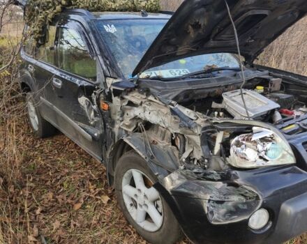 Черный Ниссан ИксТрейл, объемом двигателя 2 л и пробегом 280 тыс. км за 2500 $, фото 1 на Automoto.ua