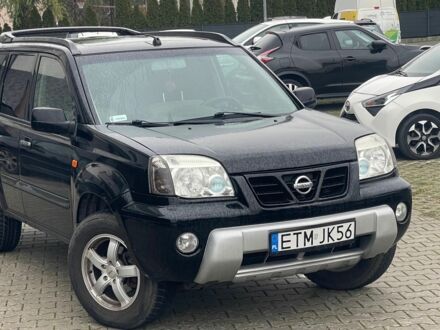 Черный Ниссан ИксТрейл, объемом двигателя 2.2 л и пробегом 290 тыс. км за 3841 $, фото 1 на Automoto.ua