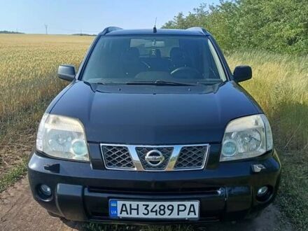 Ниссан ИксТрейл 2003 в Славянске на Automoto.ua Черный Ниссан ИксТрейл, объемом двигателя 2.49 л и пробегом 320 тыс. км за 6000 $, фото 1 на Automoto.ua